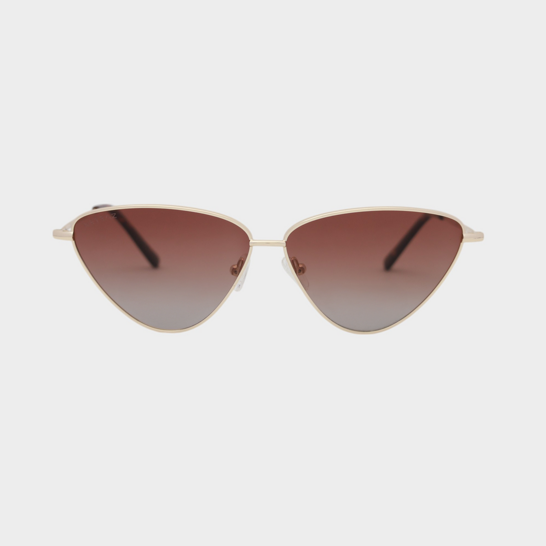 NETRAZ NZ4093 Red Triangle Cat Eye Sunglasses With Gold Frame And Red Lens Front View