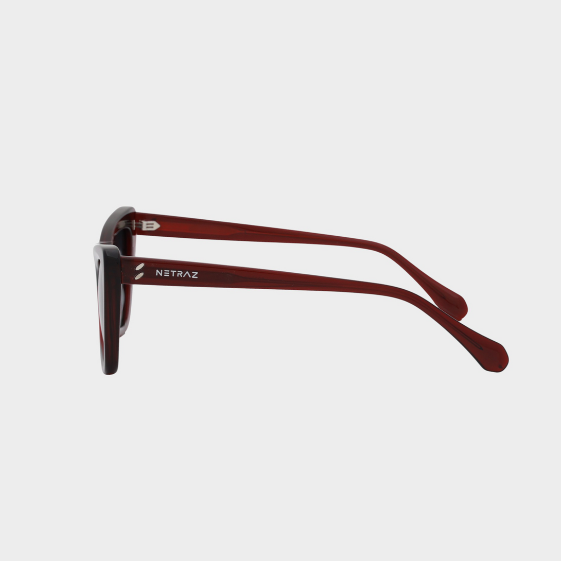 NETRAZ NZ4228 Red Cat Eye Sunglasses With Red Frame And Black Gradient Lens Left View